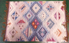 Handwoven wool rugs from Peru